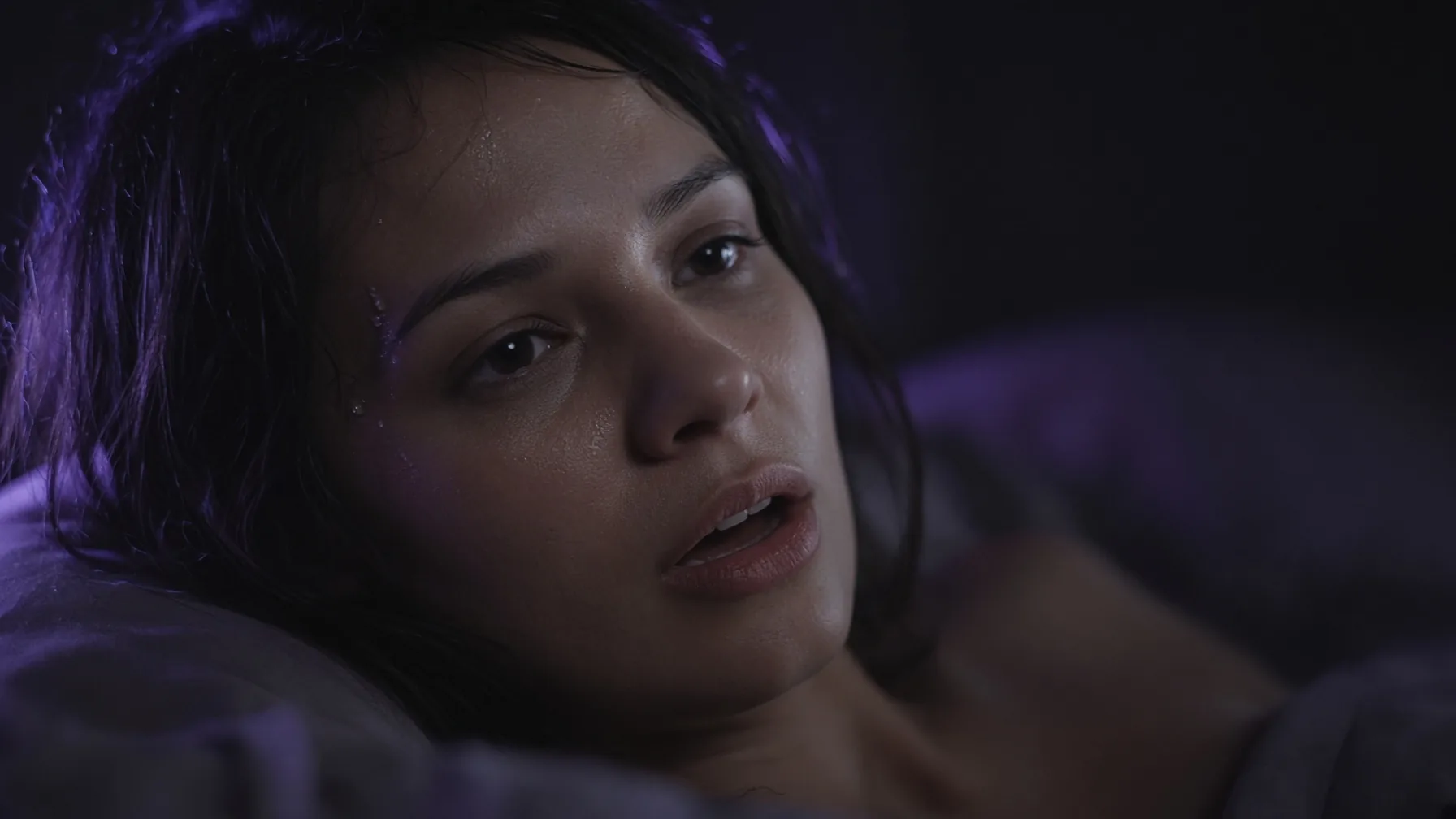 Close-up of a woman mid uncensored AI chat scene, XXXFuel